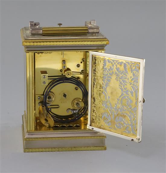 An early 20th century silvered and ormolu hour repeating carriage clock, H.6.25in.